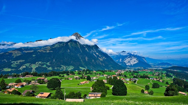 Scenic view of landscape and mountains against sky