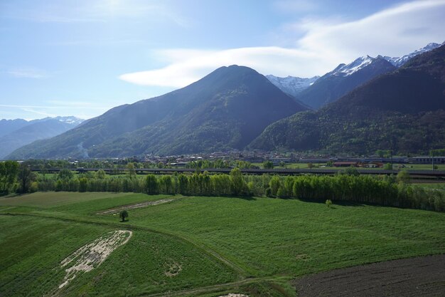 Scenic view of landscape and mountains against sky