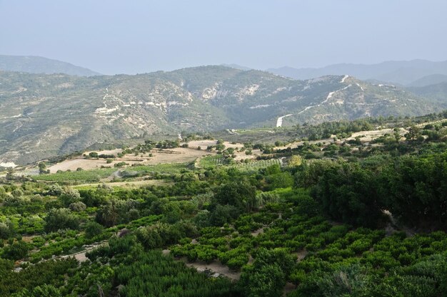 scenic view of landscape and mountains against sky