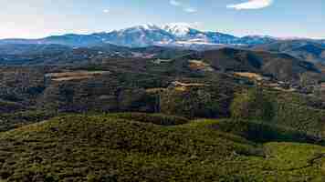 Photo scenic view of landscape and mountains