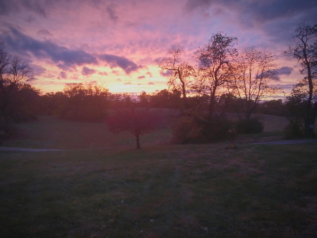 Photo scenic view of landscape at sunset