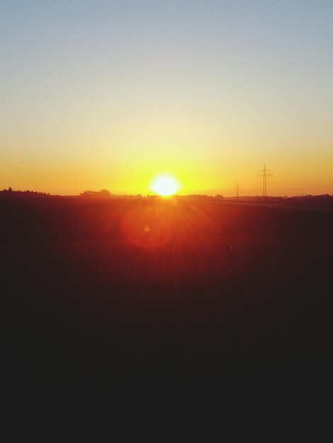 Scenic view of landscape at sunset