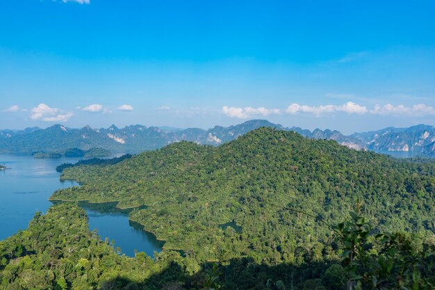 Scenic view of mountains against blue sky