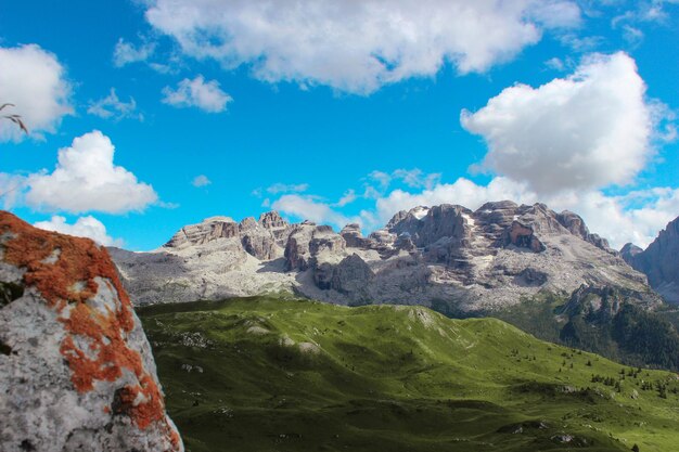 Scenic view of mountains against blue sky