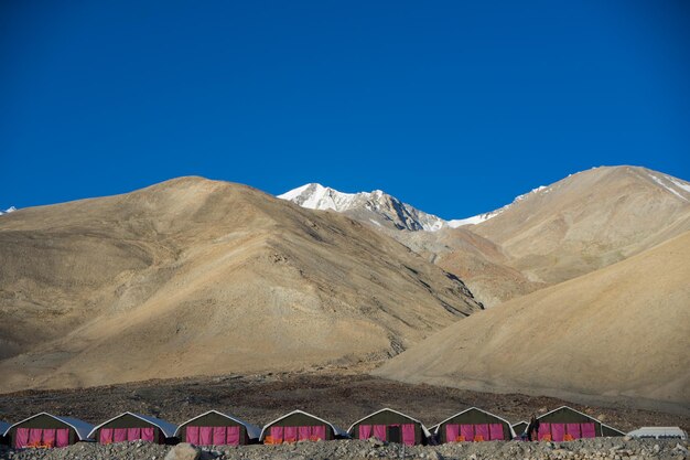 Scenic view of mountains against clear blue sky