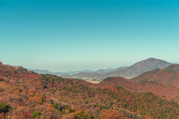 Scenic view of mountains against clear blue sky