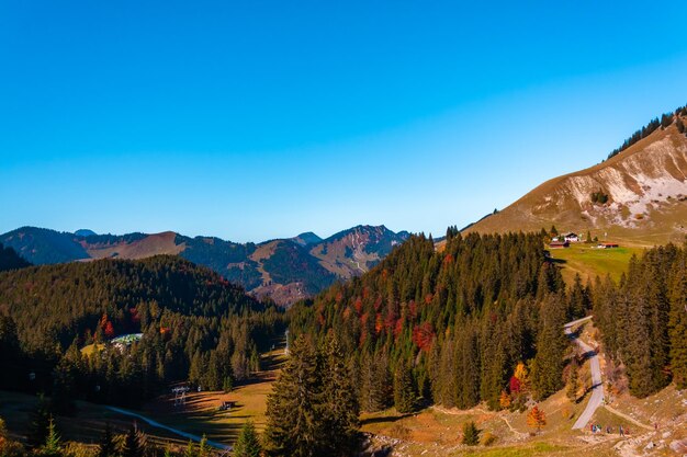 Scenic view of mountains against clear blue sky