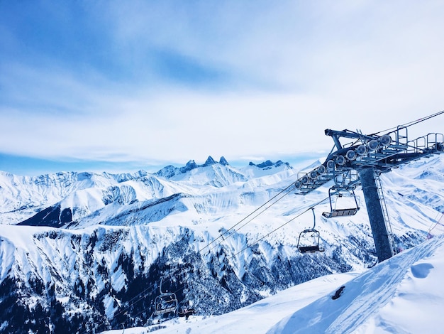 scenic view of mountains against cloudy sky