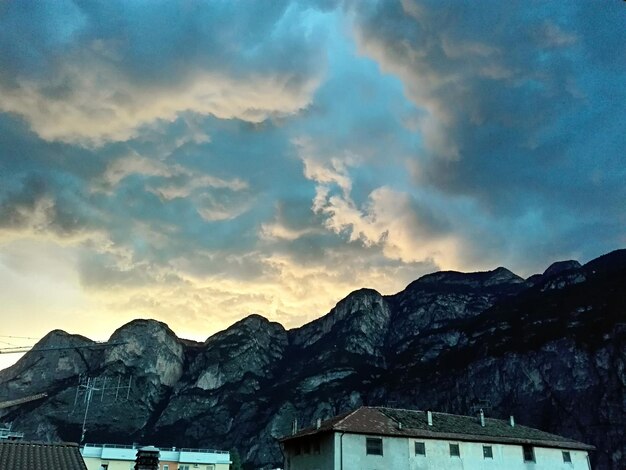 Scenic view of mountains against cloudy sky