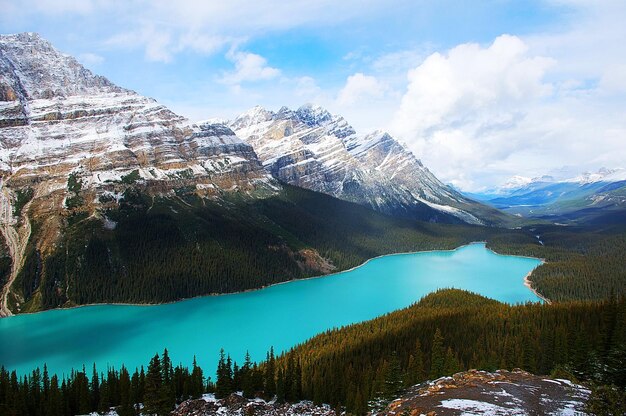 Scenic view of mountains against cloudy sky