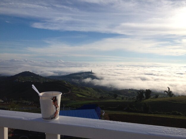 Scenic view of mountains against cloudy sky