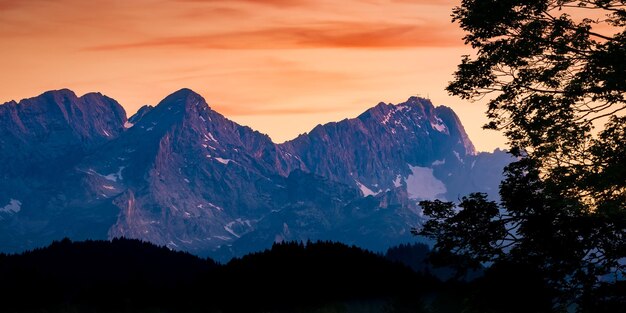 Scenic view of mountains against sky during sunset