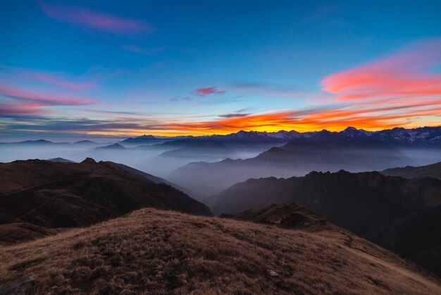 Scenic view of mountains against sky during sunset