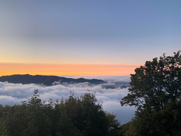 Scenic view of mountains against sky during sunset