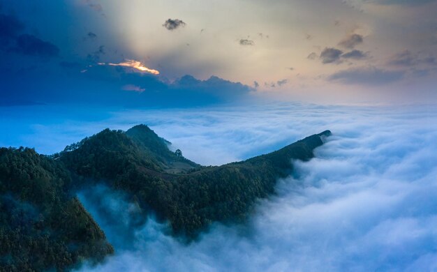 Scenic view of mountains against sky during sunset