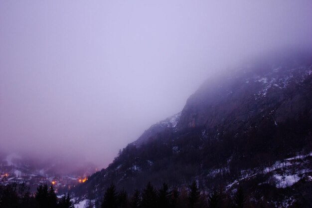 Scenic view of mountains against sky during winter