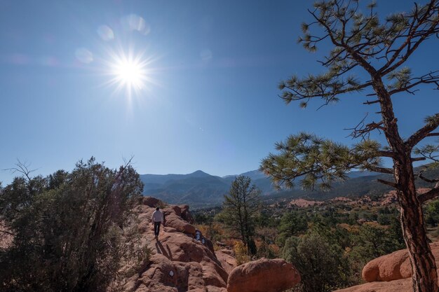 Scenic view of mountains against sky on sunny day