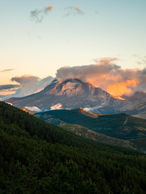 scenic view of mountains against sky during sunrise