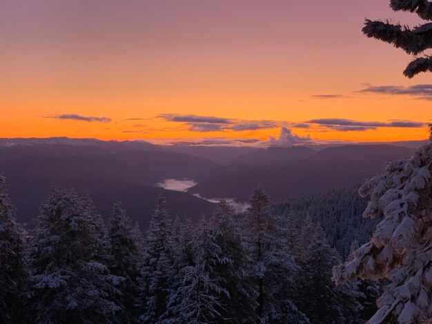 Scenic view of mountains against sky during sunset