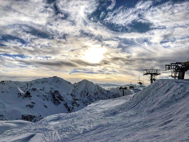 Scenic view of mountains against sky during winter