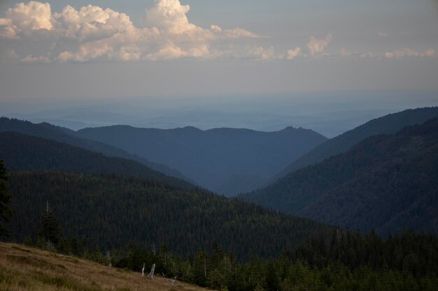 Photo scenic view of mountains against sky