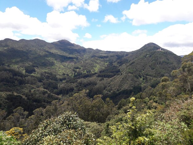 Photo scenic view of mountains against sky