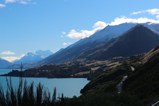 Scenic view of mountains and lake against sky