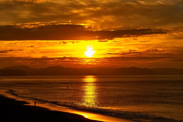 Scenic view of ocean during sunrise