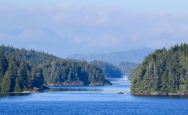 Scenic view of ocean inlets and mountain range