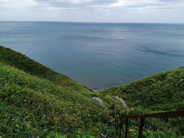 写真 空に照らされた海の景色