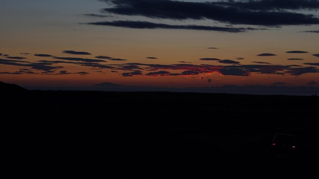Фото Вид на силуэтный пейзаж на фоне неба во время захода солнца