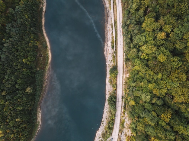 scenic view of river flowing through mountain