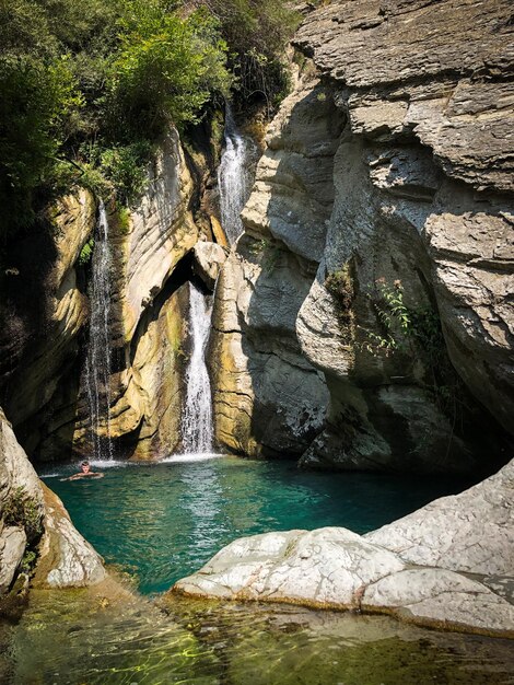 scenic view of rock formation in water