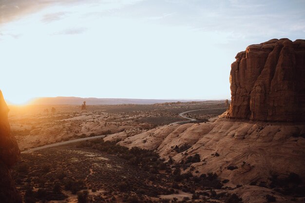 Photo scenic view of rock formations against sky