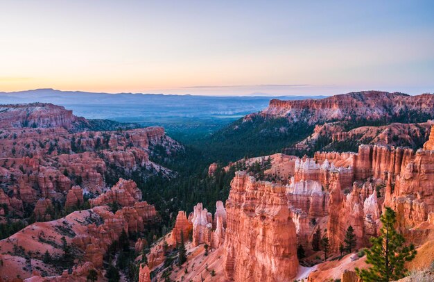 Scenic view of rock formations at sunset