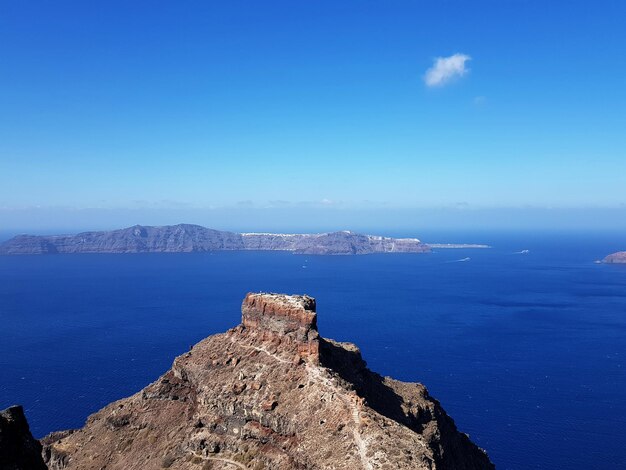 Scenic view of sea against blue sky