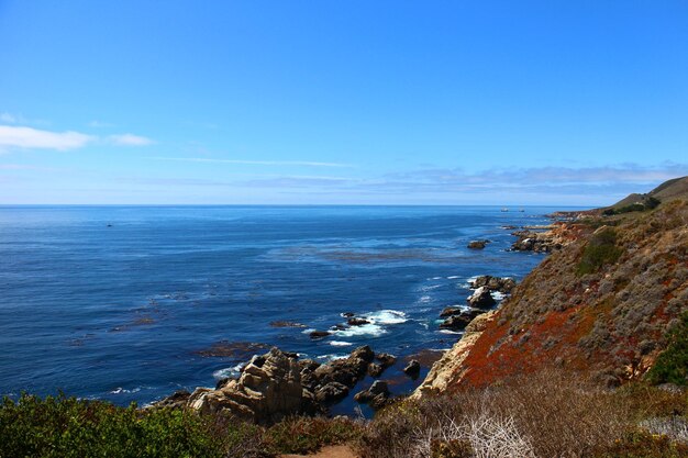 Photo scenic view of sea against blue sky