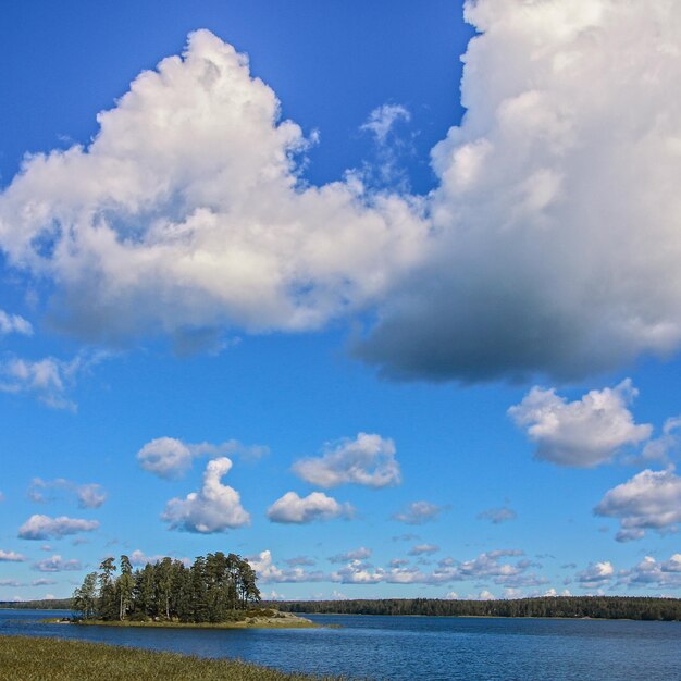 Scenic view of sea against blue sky