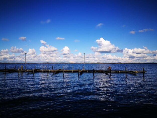 Scenic view of sea against blue sky