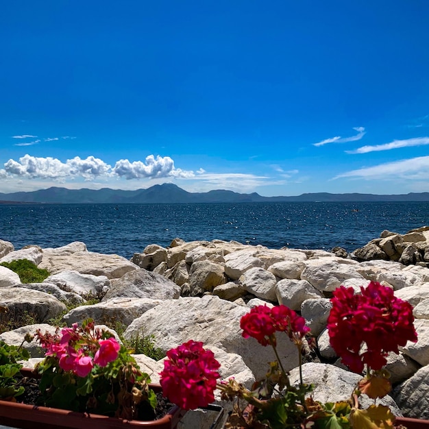 Scenic view of sea against blue sky