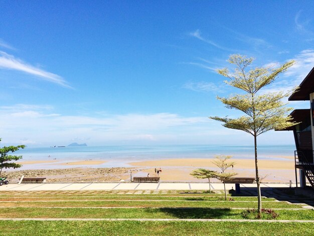 Scenic view of sea against blue sky