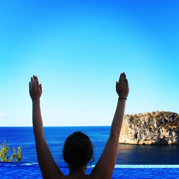 Scenic view of sea against blue sky