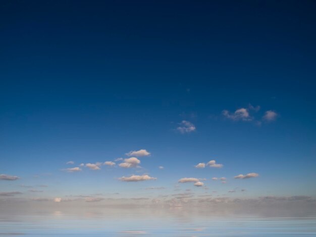 Scenic view of sea against blue sky