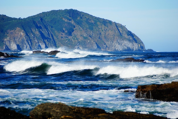 Scenic view of sea against blue sky