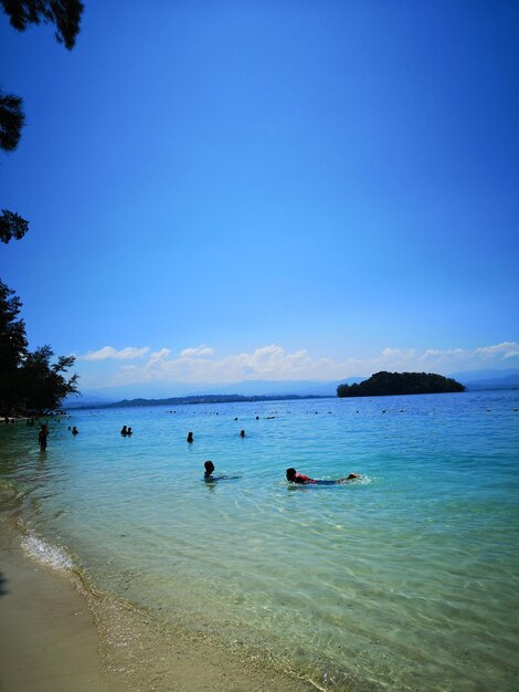 Scenic view of sea against blue sky