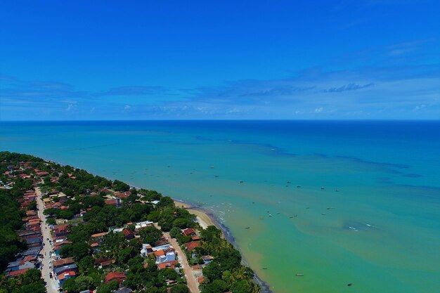 Scenic view of sea against blue sky