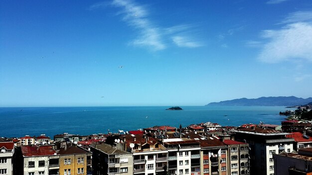 Scenic view of sea against blue sky