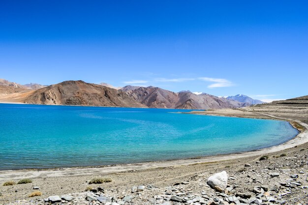 Scenic view of sea against blue sky