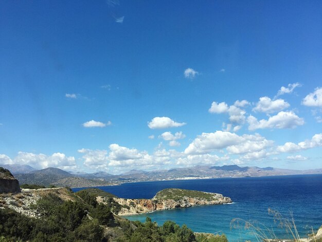 Scenic view of sea against blue sky