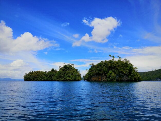 Photo scenic view of sea against blue sky